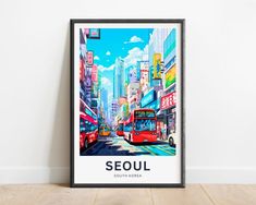 a red double decker bus driving down a street in front of tall buildings with the word seoul on it