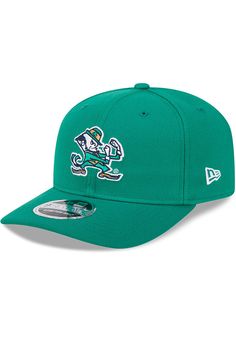 This Notre Dame Fighting Irish Kelly Green Adjustable Hat features a front embroidered team logo on a structured polyester crown with pre-curved visor, inner stretch sweatband, and adjustable closure. New Era Evergreen 9SEVENTY Stretch Snap, Front embroidered team logo, Left embroidered New Era logo, Snapback closure, Featherweight Polyester, Curved Bill, High Crown, Structured, Imported Collegiate Flat Bill Hat With Team Logo, Green Cap For Game Day, Sports Fan Hat With Team Logo And Flat Bill, Curved Brim Hats With Team Logo For Game Day, Curved Brim Hats With Team Logo For Fan Gear, Green Hat With Embroidered Logo For Baseball Season, Fan Gear Hats With Team Logo And Curved Brim, Baseball Cap With Team Logo For Fan Gear, Green Hat With Embroidered Logo For Baseball