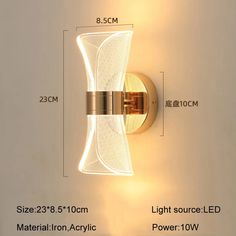 the wall light is shown with measurements for each bulb and its size, but it also has an interesting design