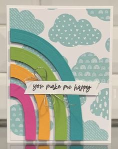 a card that says you make me happy with rainbows and clouds in the background