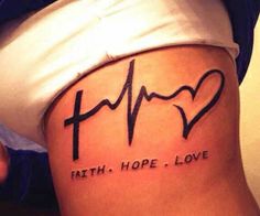 a woman's stomach with the word faith hope love written in black ink on it