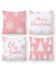 four pink and white christmas pillows with snowflakes on them