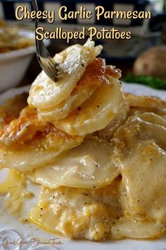 a white plate topped with pasta covered in cheese