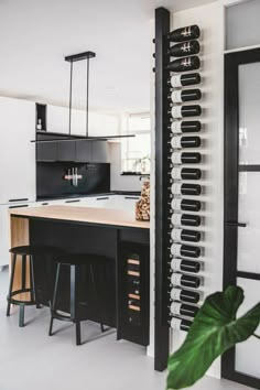 a black and white kitchen with an island