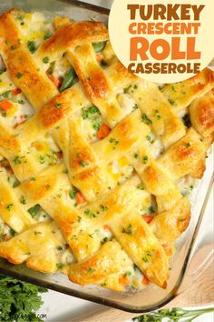 turkey crescent roll casserole in a glass dish with parsley on the side