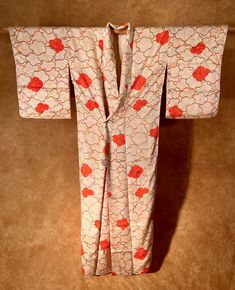 "It is an antique pure silk kimono. Although it is Mon-kinsha, it is made of a lustrous fabric that looks like rinzu. The pattern is full of plums on a cream-colored background, and some of the plums are shibori-zome (tie-dyed). It is a very elegant and beautiful kimono! Condition is as good as new.  Most of our Kimonos and Haoris are hand sewn and custom made. We measure from sleeve edge- to-edge (horizontally), and from the top (where the collar is attached) to the bottom (vertically). *Horizo Traditional Silk Kimono With Floral Print, Silk Kimono With Kimono Sleeves For Tea Ceremony, Traditional Red Silk Kimono, Traditional Floral Print Kimono For Tea Ceremony, Ceremonial Silk Kimono With Kimono Sleeves, Vintage Floral Print Kimono For Wedding, Beautiful Kimono, Beautiful Kimonos, Colored Background