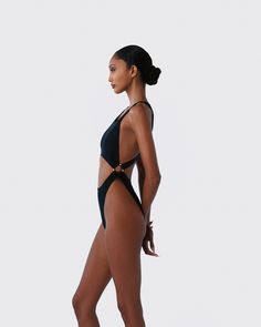 Black scoop neck monokini with Bamboo B hoop side detailsUPF 30 sun protective fabric Fitted One-piece Cutout Swimwear, Black Backless One-piece Beachwear, One-piece Cutout Bodysuit For Swimming, Poolside One-piece Cutout Bodysuit, Black Cutout One-piece Swimsuit, Swim Shop, Swim Shoes, Line Shopping, Sunglasses Shop