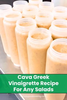 several glasses filled with food sitting on top of a metal tray next to the words cava greek vinaigrette recipe for any salads