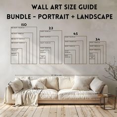 a couch sitting in front of a wall with an art size guide on it's side