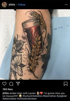 a person with a tattoo on their arm that has an image of a drink in it