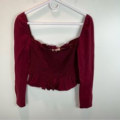 New With Tags! Truly Madly Deeply Anthropologie Smocked Top Sz M. Color: Burgundy. Msrp $88. Approx Measurements (Laying Flat, Not Stretched): Armpit To Armpit: 14” Armpit To End Of Sleeve: 18” Front Length: 11.5” Back Length: 12” Red Spring Top With Smocked Cuffs, Red Spring Tops With Smocked Cuffs, Red Smocked Top For Fall, Red Cotton Top With Smocked Back, Red Spring Top With Smocked Back, Red Casual Smocked Top With Ruffles, Fall Red Smocked Top With Smocked Back, Spring Red Smocked Top With Ruffles, Fitted Red Smocked Top With Ruffles