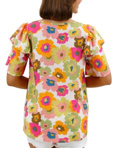 Multi Floral Summer Breeze Blouse | Multicolored Floral Blouse Summer is all about fun, bold patterns, and we’ve got you covered with the Summer Breeze Blouse! This gorgeous top features a subtle, lightly shirred v-neckline for a flattering and feminine fit; plus a playful double ruffle detail at the sleeves, all in a lightweight material and vibrant multicolor floral print that’s perfect for the season. Pair with some shorts and sandals and enjoy those breezy summer vibes! Why you’ll love it: S Pink Ruffle Sleeve Top With Floral Print, Multicolor Tops With All Over Print For Summer, Cotton Blouse With Floral Print And Ruffle Sleeves, Spring Multicolor Tops With All Over Print, Multicolor Tops With All Over Print For Spring, Relaxed Fit Multicolor Cotton Blouse, Printed Cotton Blouse With Ruffle Sleeves, Summer Multicolor Blouse With All Over Print, Cotton Ruffle Sleeve Tops With Floral Print