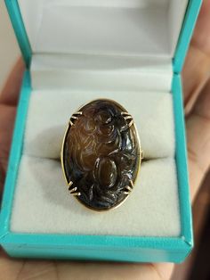 You are viewing a beautiful 14k solid gold carved flower black and brown jade ring. The ring size  measures 5 3/4 The ring itself measures 27mm x 20mm wide. The band is 4mm  The total weight of the ring 9.60 grams. Beautiful carved jade flower with black and brown jade. Good pre owned condition. Black Jade Ring, Jade Flower, Black Jade, Carved Jade, Flower Black, Jade Ring, Jade Carving, Rings Statement, Statement Rings