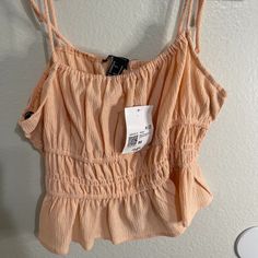 Brand New With Tags Forever 21 Size Medium Knit Cami Top, Light Coral Color. Fitted Peach Crop Top For Summer, Pink Cropped Tank Top For Spring, Trendy Fitted Peach Crop Top, Peach Sleeveless Crop Top For Spring, Spring Peach Sleeveless Crop Top, Sleeveless Peach Crop Top For Spring, Forever 21 Pink Crop Top For Summer, Casual Cropped Peach Top, Sleeveless Peach Crop Top For Summer