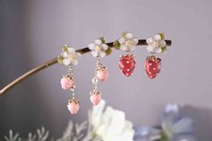 If you want personalized gift packaging, please click https://www.etsy.com/hk-en/listing/1572461679/ The strawberry flowers are all handmade by metal wire and resin, the strawberry accessories are imported from Japan,the ear pins are silver plated with gold If you would like to purchase the necklace separately, please click https://www.etsy.com/hk-en/listing/1541345526/ The chain is 16-18 (40+5cm) inches adjustable 👉SHIPPING TIME: All products are not in stock, made after placing the order and shipped within 14 days. 👉COLOR DISCLAIMER: We produce a color match to the images we receive, your screen brightness, contrast, and saturation settings will affect the image viewed on your screen. 👉YOU MAY ALSO LIKE: https://www.etsy.com/hk-en/listing/1220279472/ https://www.etsy.com/hk-en/listing Cute Drop Clip-on Earrings For Gift, Sweet Pink Drop Earrings, Sweet Pink Dangle Jewelry, Handmade Charming Pink Jewelry, Charming Handmade Pink Jewelry, Cute Pink Resin Jewelry, Pink Resin Kawaii Earrings, Cute Fruit Design Dangle Jewelry, Charming Earrings For Pierced Ears As Gift