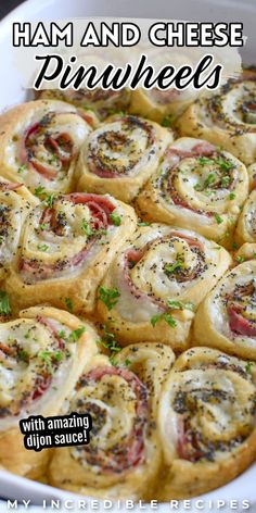 ham and cheese pinwheels with amazing dijon sauce in a casserole dish