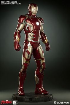 the iron man statue is on display in front of a dark background with text that reads,