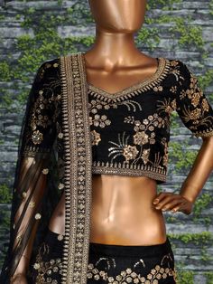 A perfect definition of superb craftsmanship in this beautiful black-colored designer Sabyasachi bridal lehenga choli. Comes with an attached can-can inside.
Beautified with amazing heavy embroidery with zari,dori & sequence work within the attire adds a sign of elegance statement with your look.
The semi-stitched lehenga is made of Thai Silk fabric accompanied with unstitched embroidered matching fabric blouse pieces and embroidered Thai Silk dupatta.
Suitable to wear for wedding functions, Unstitched Black Blouse Piece For Reception, Unstitched Black Saree For Reception, Black Unstitched Saree For Reception, Black Semi-stitched Embroidered Fabric With Pallu, Elegant Black Choli With Intricate Embroidery, Elegant Black Lehenga With Intricate Embroidery, Traditional Black Lehenga With Intricate Embroidery, Black Sharara With Intricate Embroidery For Reception, Black Lehenga With Intricate Embroidery