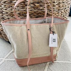 Beautiful Spring/Summer Tote In Oatmeal Linen And Pale Pink Pebbled Leather. Straps Are Adjustable With Logo Silver Hardware. Interior Zipper Pocket (Still Wrapped In Tissue). Measures 15” Long, 12” High, 7” Wide - Nice Substantial Size For Carry-On Travel Bag, Summer Purse Or Beach/Boat Tote. New Condition With No Flaws. Casual Beige Canvas Bag For Everyday, Everyday Beige Canvas Bag With Leather Handles, Everyday Beige Canvas Bag, Beige Summer Canvas Bag For Daily Use, Summer Beige Canvas Bag For Daily Use, Versatile Beige Canvas Bag, Versatile Everyday Beige Canvas Bag, Casual Cream Canvas Bag, Casual Beige Canvas Bag