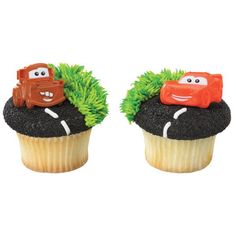 two cupcakes with cars sitting on top of each other and the words home & garden essentials $ 9 20