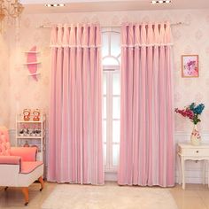 a room with pink curtains and white furniture