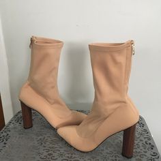 Never Worn Nude Colored Size 8 Lycra Boots By Ego With Back Zipper And 4.5” Heel. Casual Round Toe Fitted Heels, Casual Fitted Heels With Round Toe, Summer Heeled Boots With Round Toe, Casual High Ankle Heeled Boots With Padded Heel, Casual Heeled Boots With Padded Heel And Pointed Toe, Casual High Heeled Boots For Spring, Spring High Ankle Heels With Padded Ankle, Casual Ankle-high Beige Heels, Casual Ankle-high Heeled Boots With Padded Heel