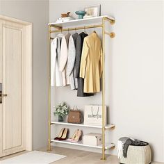 an open closet with clothes and shoes on shelves next to a white rug in front of a door