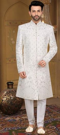 White and Off White color Sherwani in Jacquard fabric with Embroidered, Thread, Zari work Ceremonial White Embroidered Bandhgala, White Embroidered Bandhgala For Ceremony, White Resham Embroidered Kurta For Ceremony, White Resham Embroidery Kurta For Ceremony, White Embroidered Kurta For Ceremony, White Embroidered Sherwani For Ceremony, White Traditional Wear With Chikankari Embroidery For Ceremony, Traditional Sherwani With Chikankari Embroidery For Ceremony, White Bandhgala With Intricate Embroidery For Ceremonies