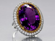 Spectacular 17.48ct Oval Amethyst, adorned by Canary Diamonds (57d=.29ctw), and then surrounded by Diamonds (136d=2.21ctw G/VS2) all set in shimmering 18k Yellow & White Gold. Total Weight of Ring is 13.8g Canary Diamond Ring, Canary Diamond, Vintage Cocktail Ring, Fancy Yellow Diamond, Purple Jewelry, Gold Cocktail Ring, Gold Cocktail, Amethyst Jewelry, Diamond Gold