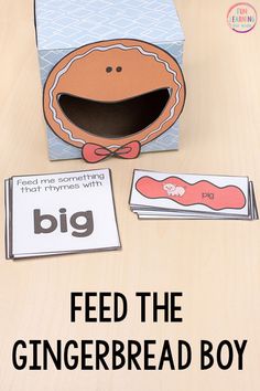 a paper box with the words feed the gingerbread boy on it and an image of a