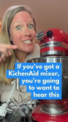 a woman pointing at a mixer with the words if you've got a kitchen aid mixer, you're going to want to hear this