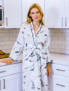 Meet your new favorite relaxation staple! This classic Birds of a Feather robe — designed to make you feel comfortable, and look even better — is made from 100% soft, mid-weight cotton and hand-block printed by artisans. Unlike bulky robes, this one is made to flatter your figure with scalloped edges, creating a feminine silhouette for every type of body. 
It’s the Goldilocks of comfort… not too tight, not too loose, just right for lounging after a shower, drinking your morning coffee, or snuggl Relaxed Fit Robe For Home Use In Spring, Relaxed Fit Cotton Home Robe, Printed Cotton Robe For Home, Cotton Floral Print Robe For Daywear, White Cotton Relaxed Fit Robe, Long Sleeve Cotton Robe With Floral Print, Spring Cotton Daywear Robe, Spring Cotton Robe For Daywear, Relaxed Cotton Kimono For Daywear