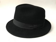 Black Rabbit Fur Felt FEDORA hat, Vintage Magill hat MFG,  montreal quebec, retro classic hat, wedding hat norfolk, aristocratic accessories Introducing the epitome of timeless elegance, the Black Rabbit Fur Felt FEDORA hat from Vintage Magill hat MFG, Montreal Quebec. This exquisite retro classic hat exudes sophistication and refinement, making it a perfect choice for any special occasion, including weddings and aristocratic gatherings. Crafted from luxurious rabbit fur felt, this Fedora hat offers a plush texture and a touch of opulence to your ensemble. The sleek black hue adds an air of mystery and allure, while the iconic Fedora shape brings a hint of vintage charm. Whether you're strolling through the city streets or attending a high-society soirée, this hat effortlessly elevates you Vintage Retro Decor, Black Fedora, Black Rabbit, Hat Wedding, Wedding Hat, Felt Fedora, Classic Hats, Montreal Quebec, Vintage Hat