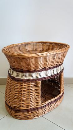 two wicker baskets stacked on top of each other