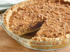 a pie sitting on top of a wooden table