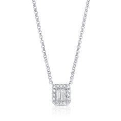 a necklace with a baguette cut diamond in the center on a white background