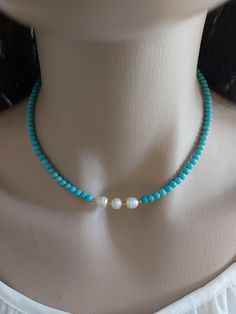 Beaded necklace is an excellent and elegant gift for your lovelies. Choker necklace is made of turquoise bead, freshwater pearl and  gold plated apparatus. You can wear the turquoise necklace to a wedding party and look very special. Freshwater pearl necklace is a nice Christmas gift, Valentine's Day gift, wedding gift, birthday gift, bridesmaid gift and other special day gift for her. Your pearl jewelry will be put in a nice tulle sachette. Beaded Pearl Jewelry, Elegant Adjustable Beaded Turquoise Necklace, Elegant Turquoise Necklace With Round Beads As Gift, Turquoise Beaded Necklaces With Pearl Chain As Gift, Elegant Handmade Turquoise Beaded Necklaces, Elegant Handmade Turquoise Necklace With Round Beads, Turquoise Beaded Pearl Necklace As Gift, Turquoise Jewelry With Pearl Chain And Round Beads, Elegant Turquoise Jewelry With Tiny Beads