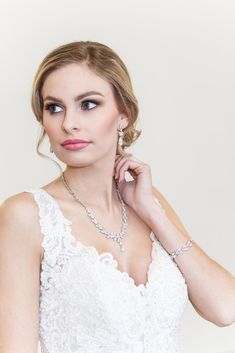 Add dainty elegance with these cascading cubic zirconia teardrop wedding earrings, necklace and bracelet set, featuring marquise and pear clusters ending in elongated teardrops set in brilliant rose gold. This set is sure to make a statement and add elegance to your wedding attire!  DETAILS * High quality cubic zirconia.  * Earrings measure 1 1/2 inches. (pierced or clip ons) * Necklace is adjustable with multiple lengths to choose from. * Standard necklace is available in 17" with an additional Camilla Rose, Luxury Accessories Woman, Rose Gold Jewelry Set, Rose Gold Bridal Jewelry, Gold Jewelry Set, Kerala Wedding, Bridal Jewelery, Wedding Necklace Set, Bridal Necklace Set