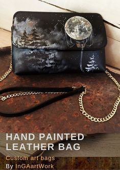 Black Full Moon bag. Letaher gold chain clutch. Handwritting and painting ✿-----Item details: ON ORDER ONLY*The clutch made by order, I will make similar, but not the same because this is a handmade product. The photo is just a sample.✿-----Length:	24 cm 9.4 inWidth:	6 cm 2.4 inHeight:	15 cm 5.9 inShoulder belt:	145 cm 57 inClosure Type:	Magnetic claspMetallic pieces:	golden colorWeight:	0,40 kg 0.88 lb #blackclutch #paintedbag #steampunkbag #moongag #fullmoon Painted Purses, Painted Leather Bag, Steampunk Black, Moon Balloon, Shoulder Guard