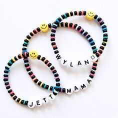 The CUTEST & HAPPIEST bracelet! Personalize with the name or initial of your choosing (or no name) and pair with the yellow smiley Made with 4mm black czech beads & 4mm rainbow heishi disc beads Personalized Black Beaded Bracelets, Letter Beads Round Friendship Bracelet, Personalized Fun Beaded Bracelets For Everyday, Customizable Multicolor Beaded Bracelets For Everyday, Multicolor Name Bracelet With Letter Beads And Round Beads, Playful Black Beaded Bracelets With Letter Beads, Customizable Heishi Bead Bracelets, Multicolor Name Bracelet With Letter Beads, Multicolor Name Bracelet With Round Letter Beads