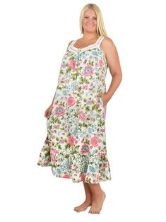 This 100% cotton sleeveless gown has a sweetheart neckline trimmed with beautiful cotton crochet lace beaded with ribbon trim. The soft cotton fabric is printed with a rich English Garden print teeming with delicate blooms. The 5 button placket opening makes it easy to put on and take off. A full flounce is added to the mid-calf hemline for added ease in walking. Side seam pockets have been added for convenience and can accommodate small items. Style: GownMaterial: 100% CottonPattern: Floral Nec