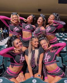 the cheerleaders are posing for a photo together