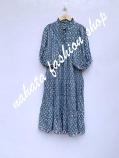 ITEM DESCRIPTION indian blue green floral pattern printed women's maxi dress - V neckline with frill collar long dress - 3/4th sleeves boho dress  Features: 3/4th sleeve, V neck, Long dress Fabric : 100% Cotton Cambric hand block print fabrics  Sleeve Length = 18 inch For more sizes & their measurement, please refer our below chart to understand the sizes variations available with us For your size requirement, please mention your size in seller note at the time of buying. SIZE MEASUREMENT  BUSTL Multicolor Floral Print V-neck Boho Dress, Button Maxi Dress, Indian Blue, Long Summer Dresses Maxi, Folk Style Long-sleeved Floral Print Dress, Floral Prints Pattern, Women Maxi, Maxi Dress Cotton, Block Printing Fabric