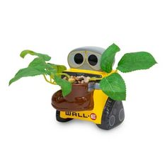 a toy car with a plant growing out of it's trunk and the word wall - e written on its side