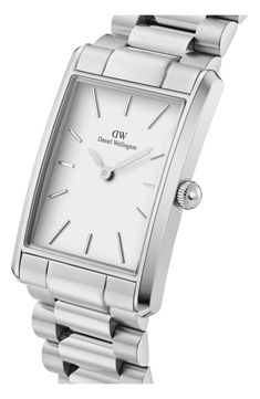 A rectangular case streamlines the silhouette of this hyperminimalist bracelet watch marked with stick indexes. 35mmW x 24mmH case Quartz movement Stainless steel Made in Japan Classic Rectangular Watch With Analog Display, Business White Rectangular Watch Accessories, Classic Rectangular Watch Accessories For Everyday, Classic Everyday Rectangular Watch Accessories, Classic Watches With Rectangular Metal Dial, Classic Silver Rectangular Watch Accessories, White Rectangular Business Watch, Modern Rectangular Watches With Metal Dial, Silver Rectangular Watch Accessories With Analog Display