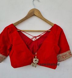 1. Fabric - Silk. 2. V NECK BLOUSE.  3. Elbow Sleeves Blouse. V-neck Blouse Piece For Wedding Festivals, Traditional V-neck Wedding Blouse, Red V-neck Blouse For Wedding, Embroidered V-neck Wedding Blouse, V-neck Blouse With Zari Work For Wedding, Traditional Blouse Piece With Back Yoke For Party, Traditional Party Blouse With Back Yoke, Fitted Blouse With Back Yoke For Wedding, Wedding V-neck Blouse With Zari Work