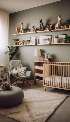 a baby's room with stuffed animals on the shelves