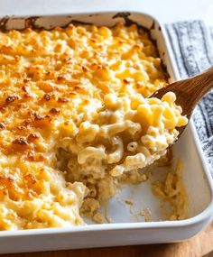 a casserole dish filled with macaroni and cheese