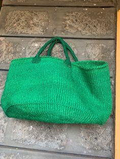 "Etra Large Kiondo shopping bag,Oval base sisal bag, storage bag, Home organizing bag,Sisal kiondo basket, Green kiondo bag. The Natural color with black stripes bag is great for your day out shopping or at the beach. Can also be used for your home organization and storage. Dimensions Top 30\" Height 13.5\" Base lenght 20\"x 13.5\" wide Ready to ship Thank you so much for shopping with us!" Green Jute Bags With Braided Handles, Green Jute Bag For Vacation, Green Woven Jute Bag, Beach Handwoven Green Bag, Green Jute Straw Bag For Daily Use, Green Jute Travel Bag, Green Handwoven Summer Beach Bag, Green Rectangular Jute Shoulder Bag, Green Straw Tote Bag For Shopping