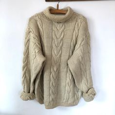 "Such a lovely vintage 80's handknitted wool turtleneck sweater with cable knit motifs. Light beige color. Material:100% wool Oversized fit. Will fit size M-L Measurements: shoulder to shoulder:20\" pit to pit:22,5\" length:25\" Very good condition." Suede Blazer, Linen Mini Dress, Wool Turtleneck, Oversized Pullover, Pullover Sweater Women, Vintage Wool, Vintage Linens, Women Pullover, Light Beige